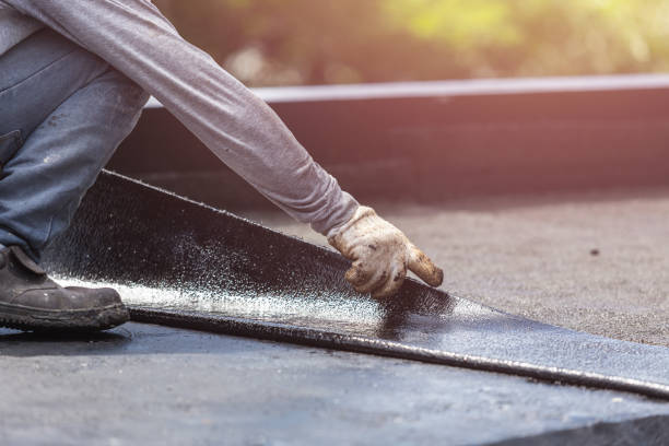 Professional Emergency Waterproofing technician working in Hayfield, MN